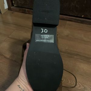 Size 8, brown thigh high boots.